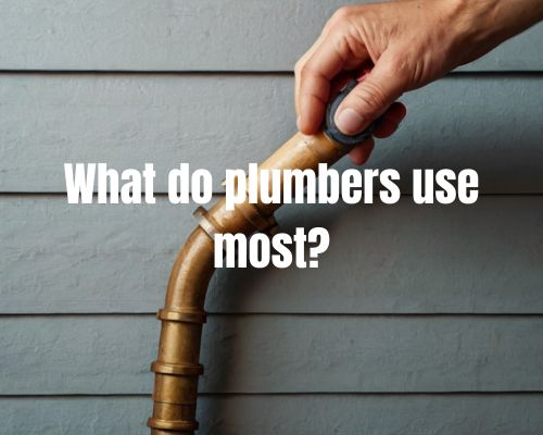 plumber-holding-a-metal-pipe